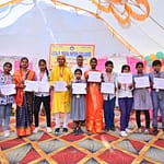 JYLD Ideal Inter College varshikotsav 2026 mein annual function mein participate karne wale vidyarthiyon ko participation certificate diya gaya manch par